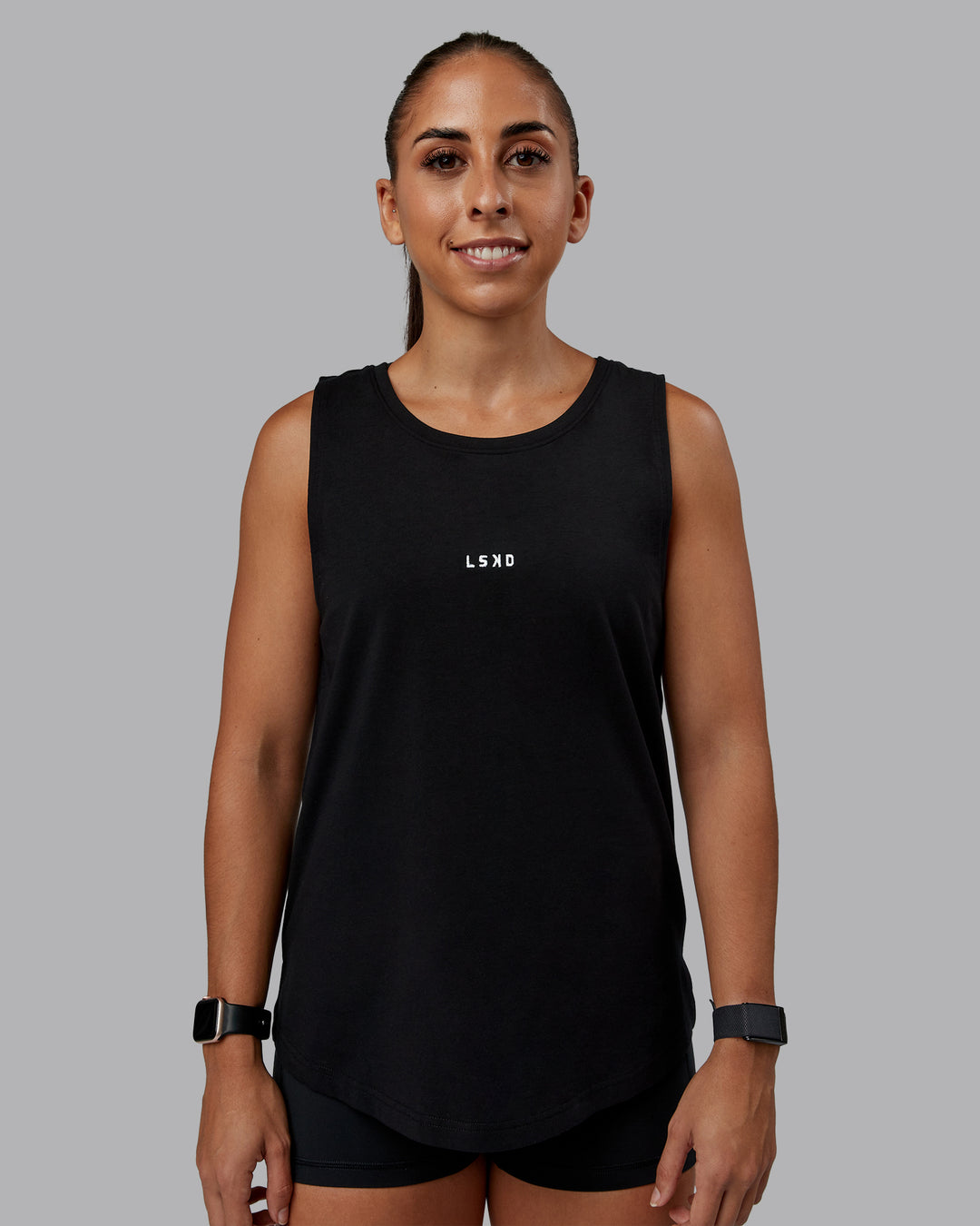 Woman wearing Go-To FLXCotton Longline Tank - Black-White | Size:S | Model:Tylah - view 3