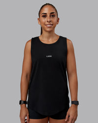 Woman wearing Go-To FLXCotton Longline Tank - Black-White | Size:S | Model:Tylah | Thumbnail Index: 2