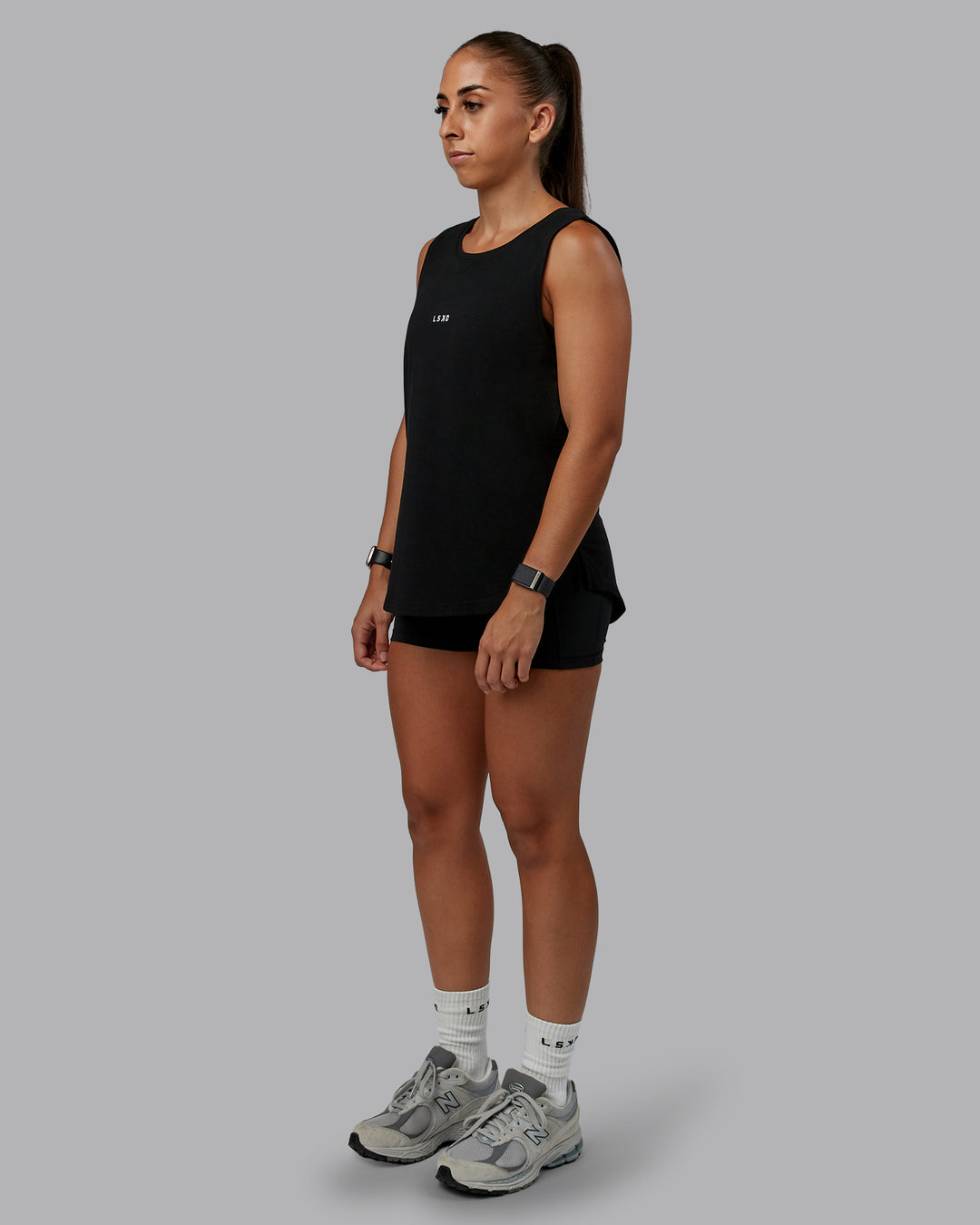 Woman wearing Go-To FLXCotton Longline Tank - Black-White | Size:S | Model:Tylah - view 2