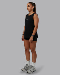 Woman wearing Go-To FLXCotton Longline Tank - Black-White | Size:S | Model:Tylah | Thumbnail Index: 1