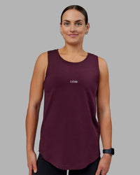 Woman wearing Go-To FLXCotton Longline Tank - Cherry Lacquer-White | Model:Keisha | Size:S | Thumbnail Index: 0
