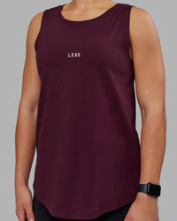 Woman wearing Go-To FLXCotton Longline Tank - Cherry Lacquer-White | Model:Keisha | Size:S | Thumbnail Index: 4