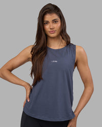 Woman wearing Go-To FLXCotton Longline Tank - Night Shadow-White | Model:Phoebe | Size:S | Thumbnail Index: 1