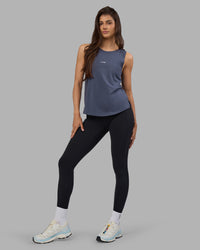 Woman wearing Go-To FLXCotton Longline Tank - Night Shadow-White | Model:Phoebe | Size:S | Thumbnail Index: 0