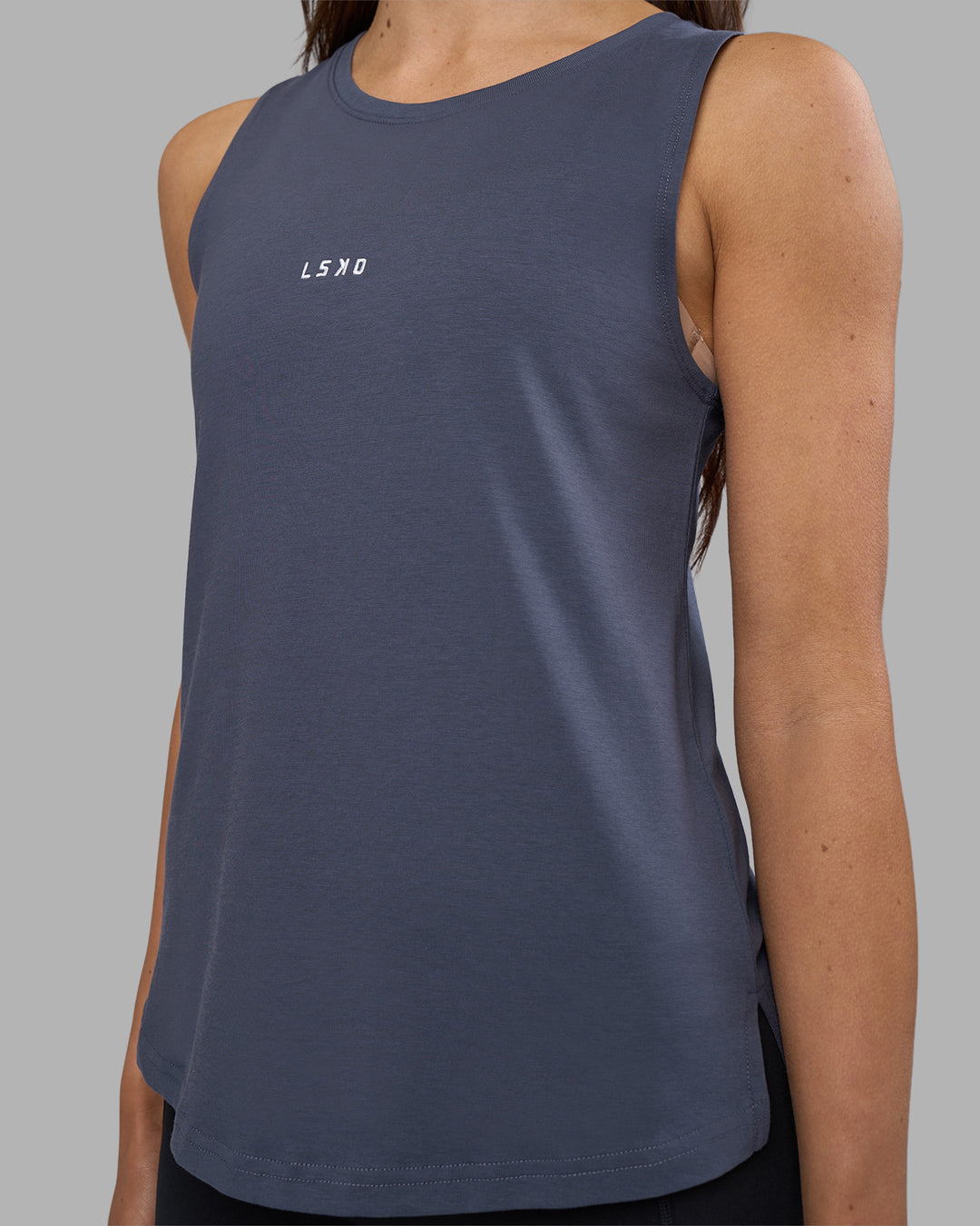 Woman wearing Go-To FLXCotton Longline Tank - Night Shadow-White | Model:Phoebe | Size:S - view 4