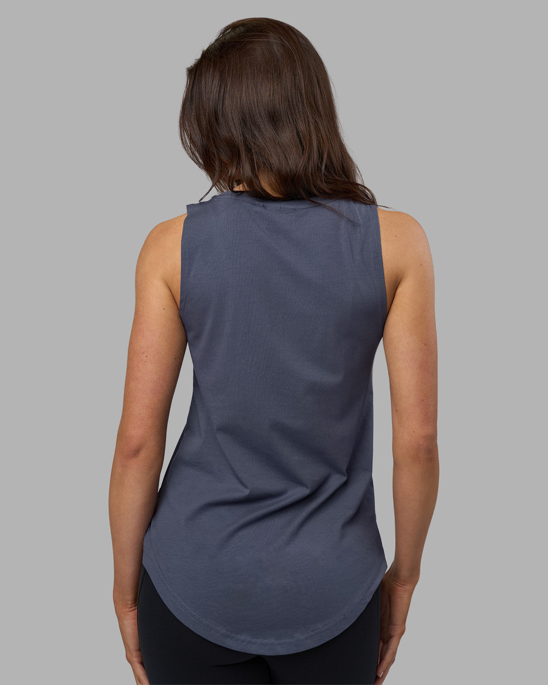 Woman wearing Go-To FLXCotton Longline Tank - Night Shadow-White | Model:Phoebe | Size:S - view 3