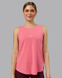 Woman wearing Go-To FLXCotton Longline Tank - Pink Lemonade-White | Model:Emilie | Size:S | Thumbnail Index: 0