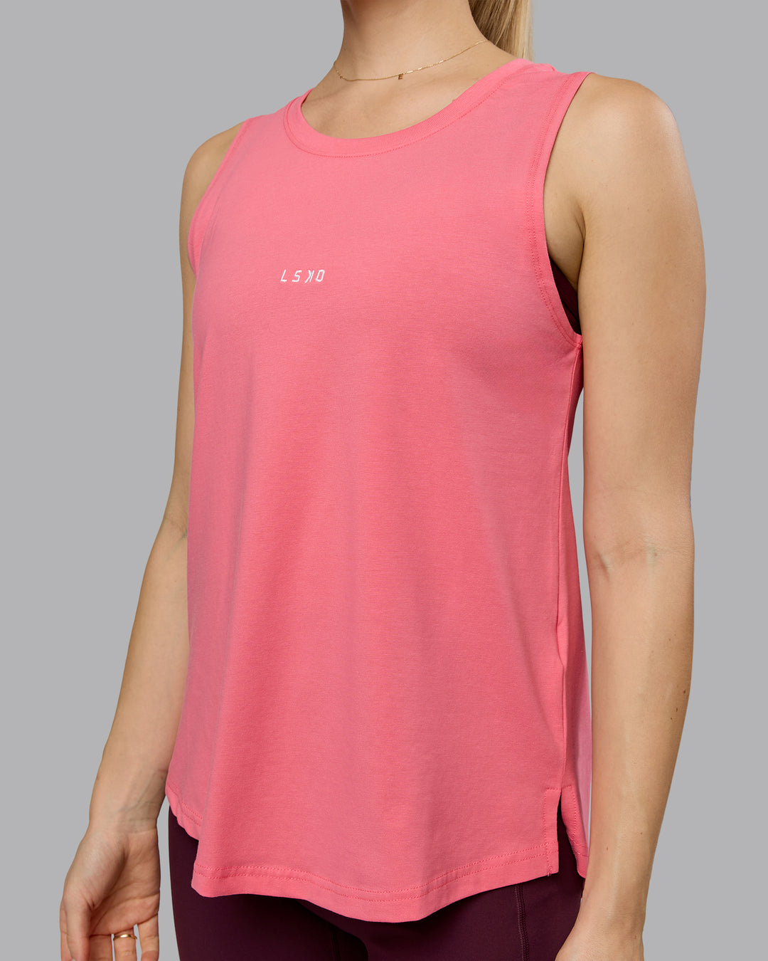 Woman wearing Go-To FLXCotton Longline Tank - Pink Lemonade-White | Model:Emilie | Size:S - view 3