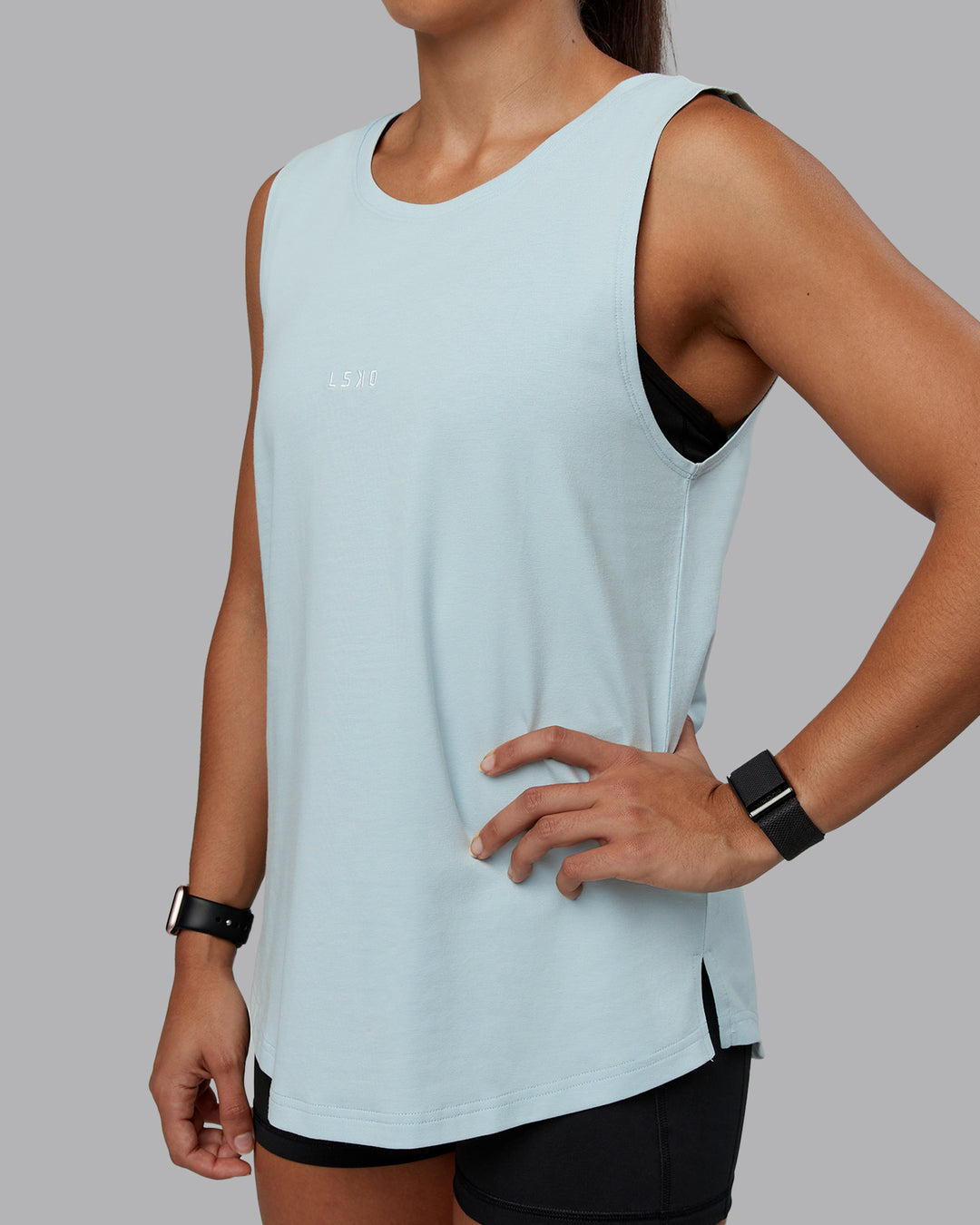 Woman wearing Go-To FLXCotton Longline Tank - Skyride-White | Size:S | Model:Tylah - view 5