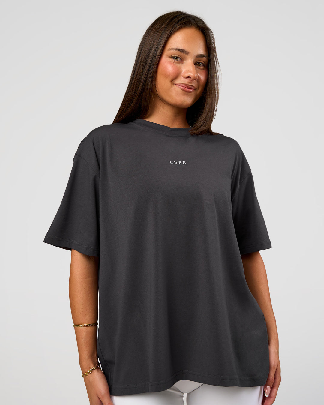Woman wearing Go-To FLXCotton Oversized Tee - Dark Storm-White | Model:Bianca | Size:S - view 1