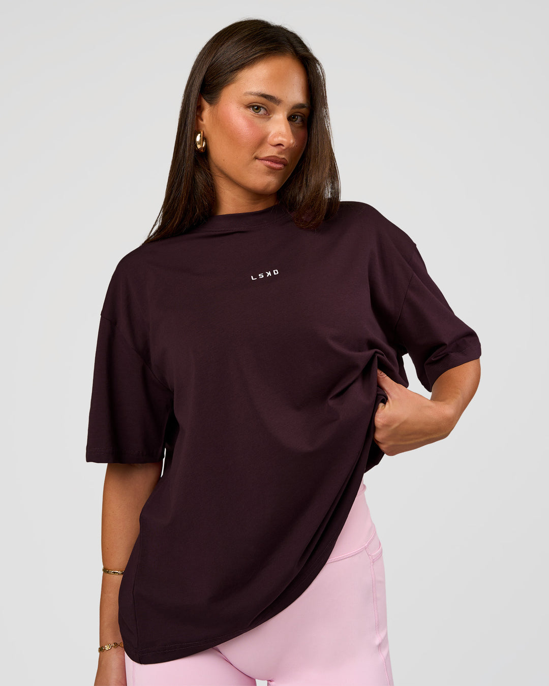 Woman wearing Go-To FLXCotton Oversized Tee - Midnight Plum-White | Model:Bianca | Size:S - view 1