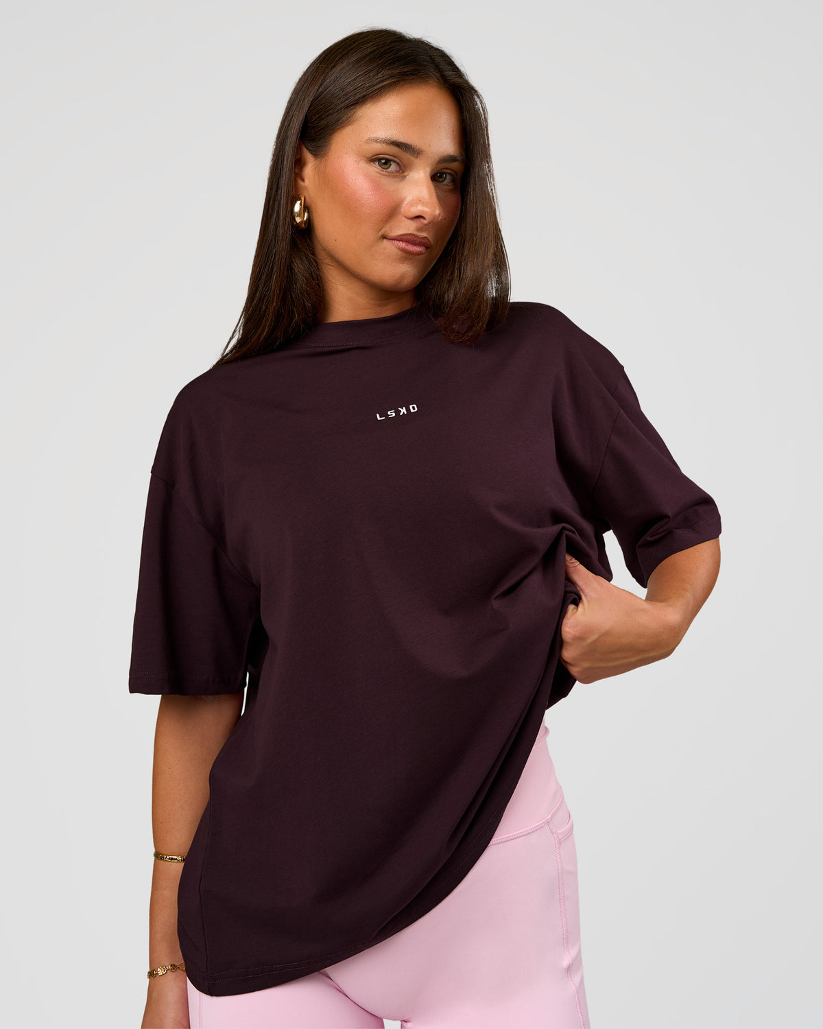 Woman wearing Go-To FLXCotton Oversized Tee - Midnight Plum-White | Model:Bianca | Size:S