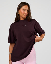 Woman wearing Go-To FLXCotton Oversized Tee - Midnight Plum-White | Model:Bianca | Size:S | Thumbnail Index: 0