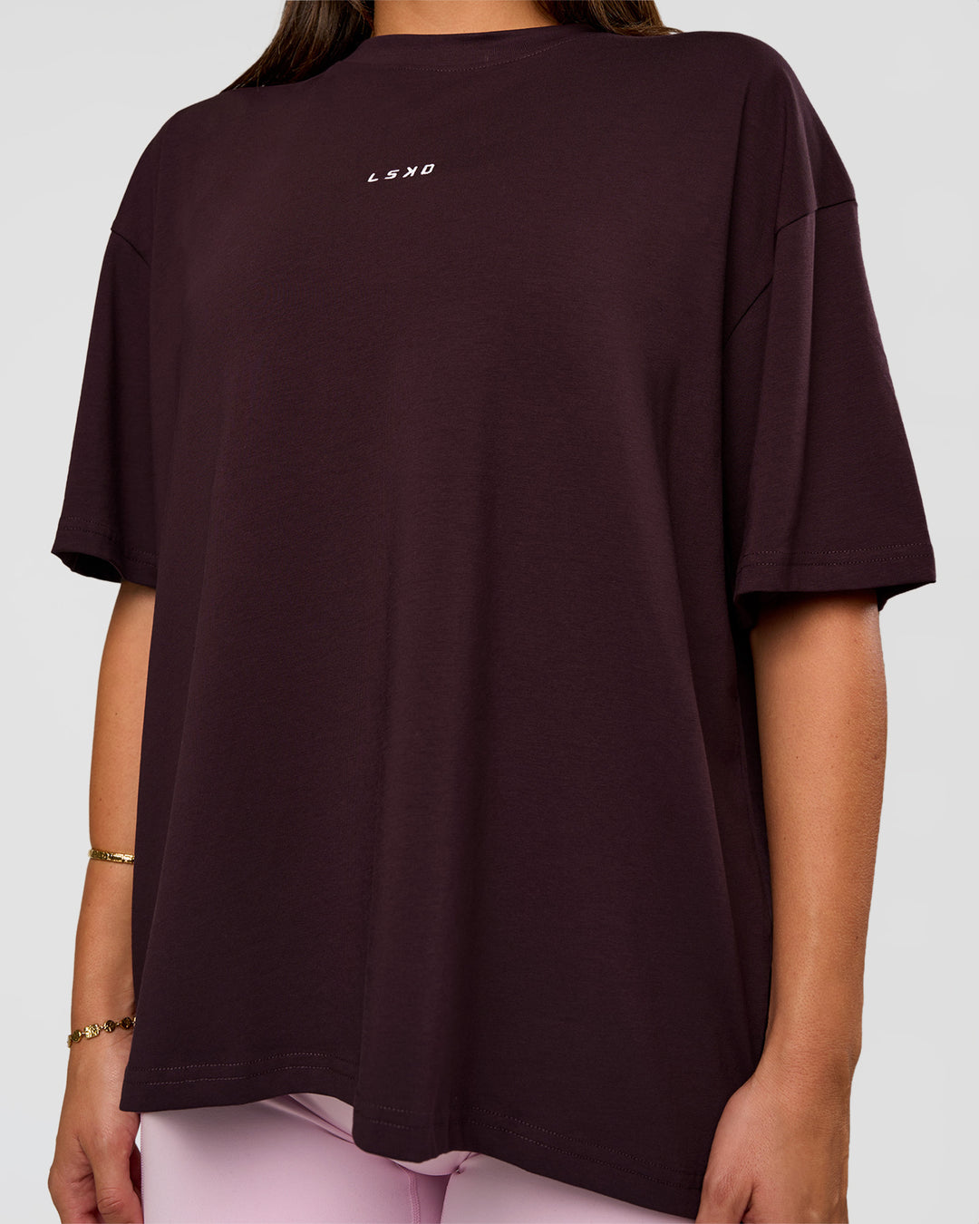 Woman wearing Go-To FLXCotton Oversized Tee - Midnight Plum-White | Model:Bianca | Size:S - view 6