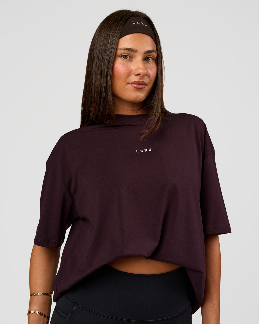 Woman wearing Go-To FLXCotton Oversized Tee - Midnight Plum-White | Model:Bianca | Size:S - view 4