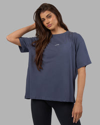 Woman wearing Go-To FLXCotton Oversized Tee - Night Shadow-White | Model:Phoebe | Size:S | Thumbnail Index: 0