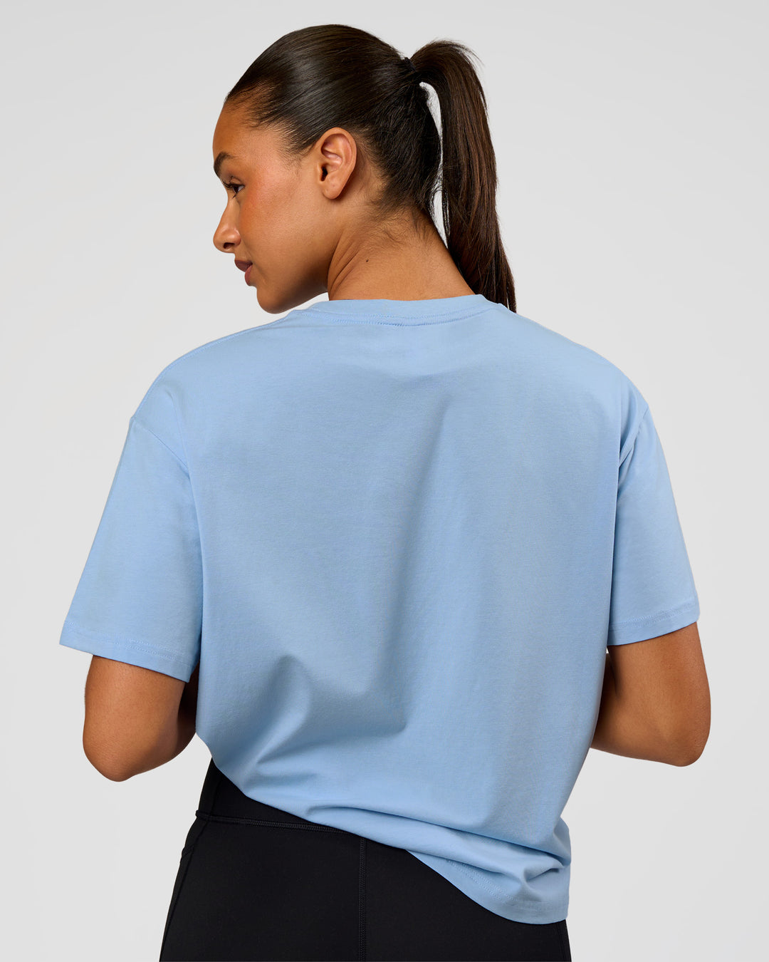 Woman wearing Go-To FLXCotton Oversized Tee - Open Air-White | Model:Rosie | Size:S - view 3