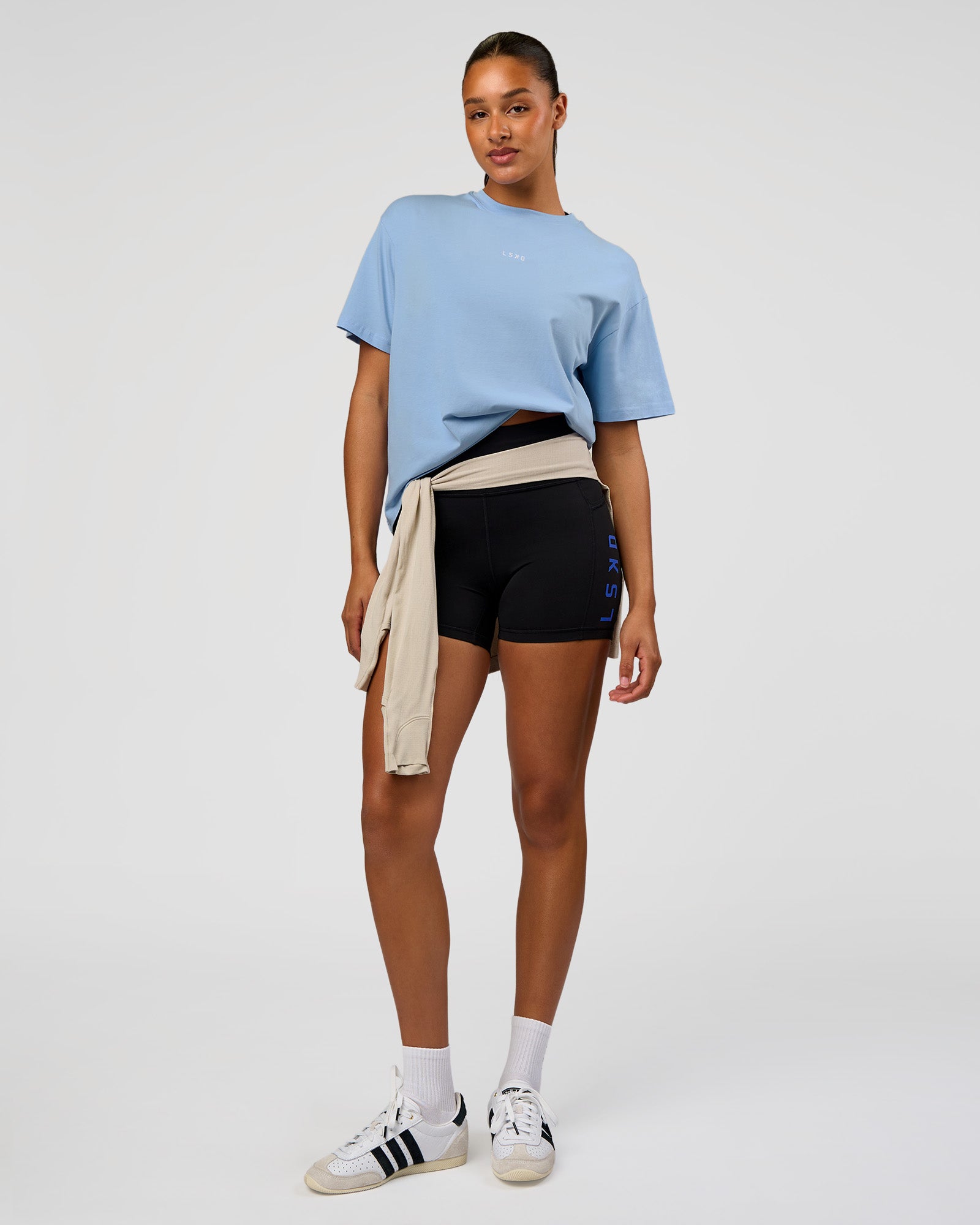 Woman wearing Go-To FLXCotton Oversized Tee - Open Air-White | Model:Rosie | Size:S