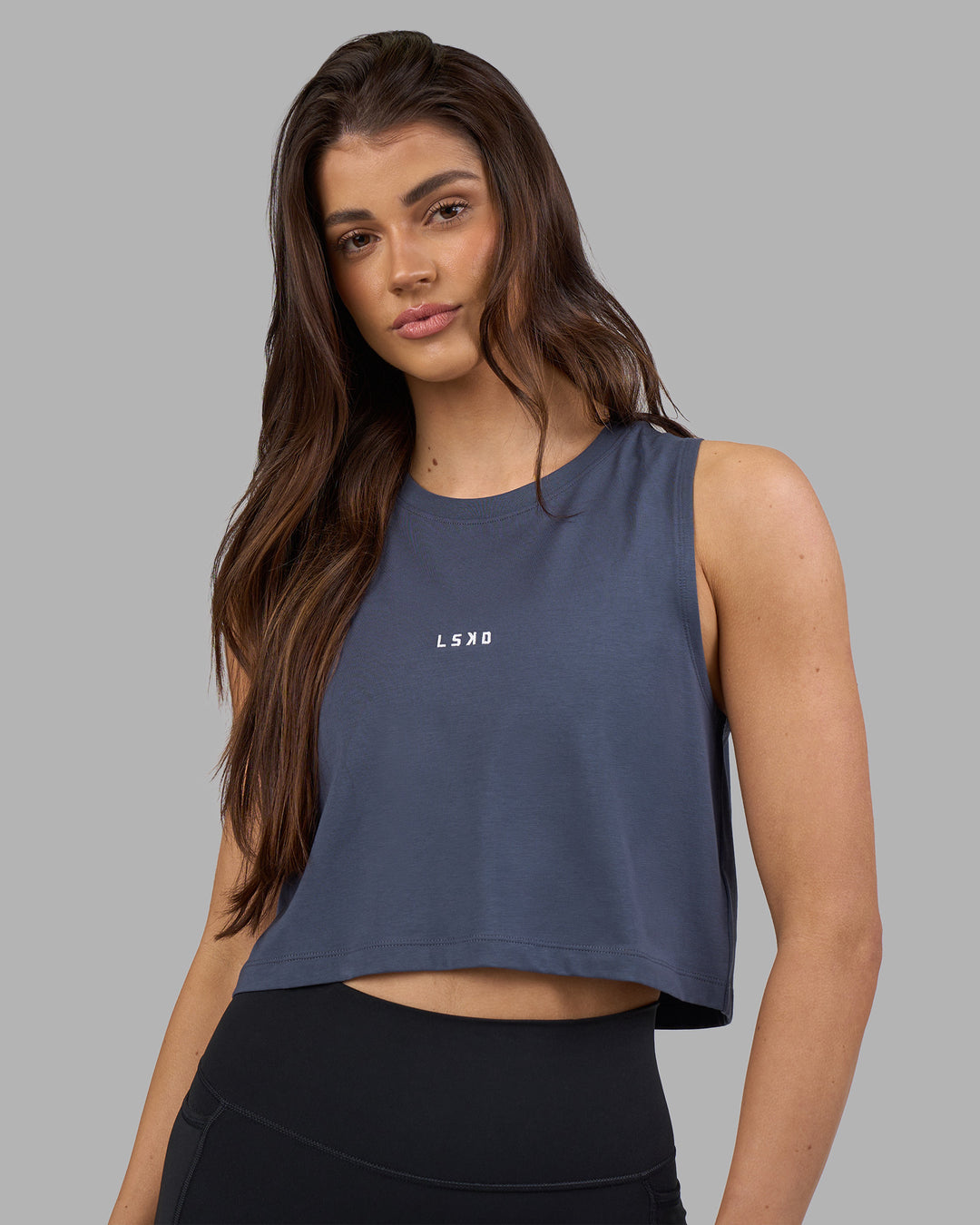 Woman wearing Go-To FLXCotton Tank - Night Shadow-White | Model:Phoebe | Size:S - view 1
