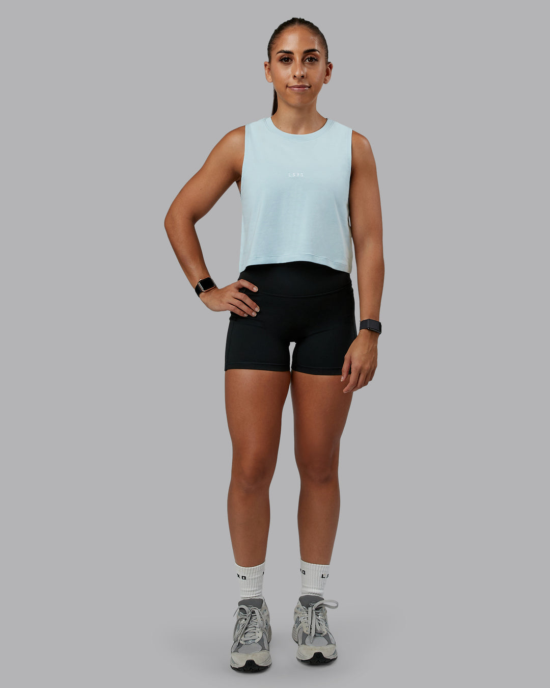 Woman wearing Go-To FLXCotton Tank in Skyride-White | Size:S | Model:Tylah - view 5