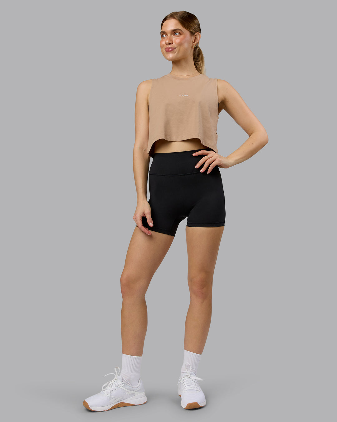 Woman wearing Go-To FLXCotton Tank - Warm Smoke-White | Model:Emilie | Size:S - view 2