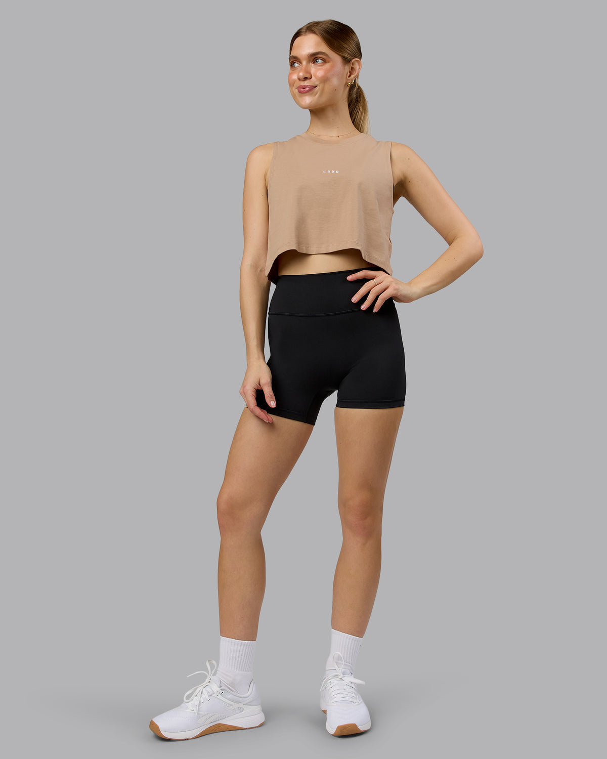 Woman wearing Go-To FLXCotton Tank - Warm Smoke-White | Model:Emilie | Size:S