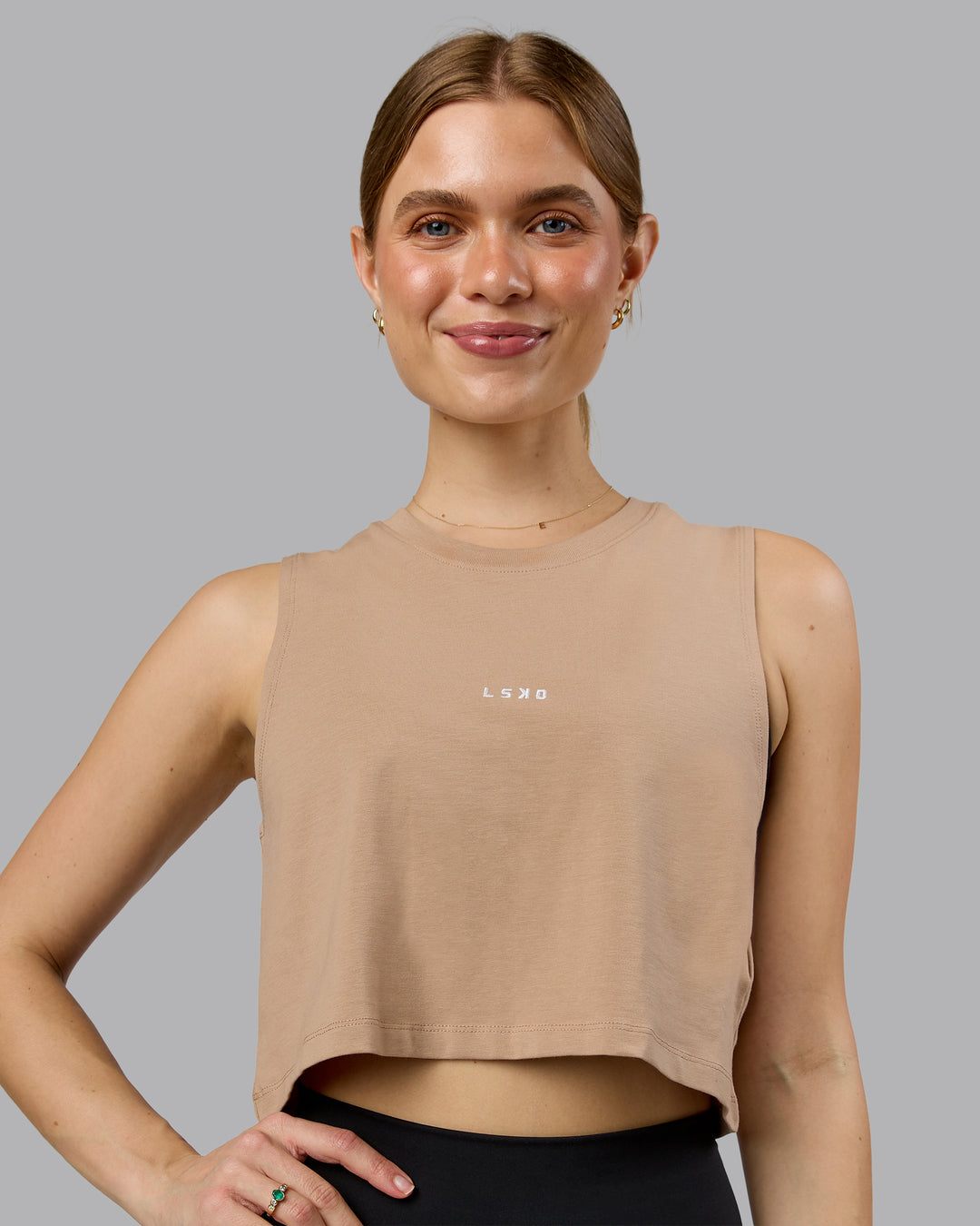 Woman wearing Go-To FLXCotton Tank - Warm Smoke-White | Model:Emilie | Size:S - view 1
