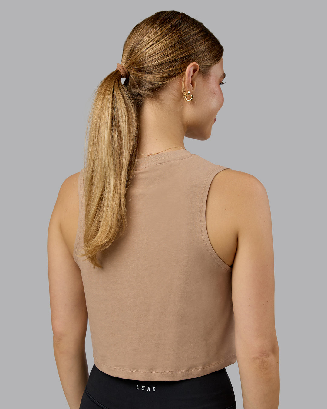 Woman wearing Go-To FLXCotton Tank - Warm Smoke-White | Model:Emilie | Size:S - view 3