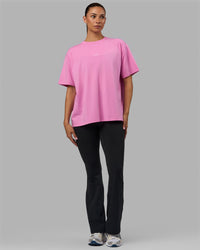 Woman wearing Go-To FLXCotton Oversized Tee - Spark Pink-White | Thumbnail Index: 1