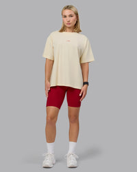 Woman wearing Go-To FLXCotton Oversized Tee - Ivory-Cherry Red | Thumbnail Index: 5
