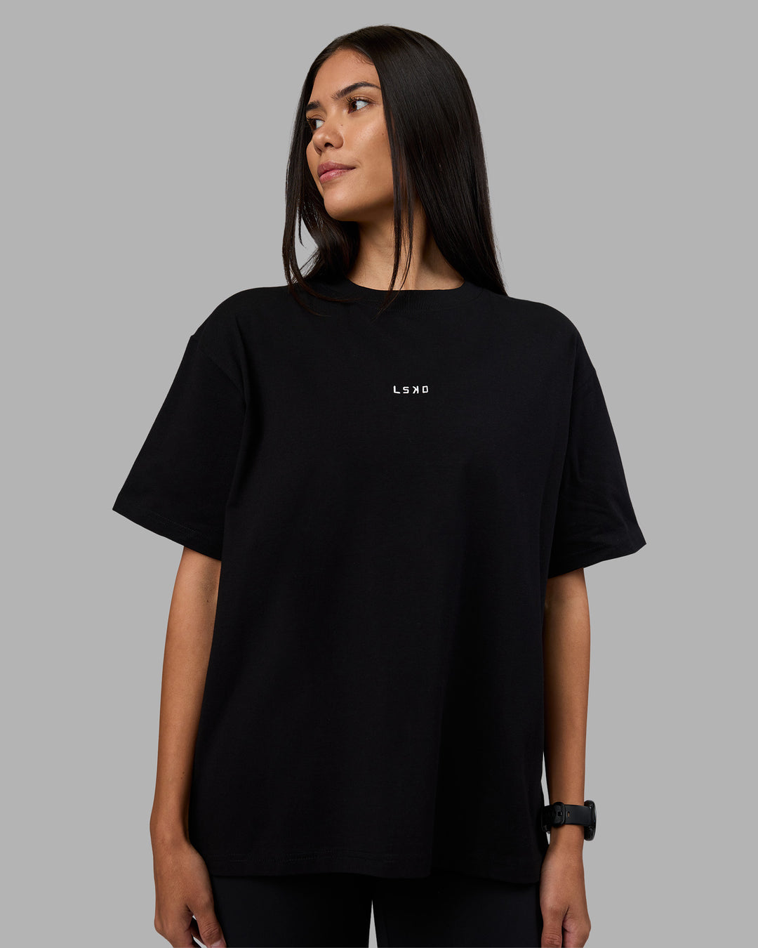 Woman wearing Go-To Heavyweight Oversized Tee - Black | Model:Rhiley | Size:S - view 1