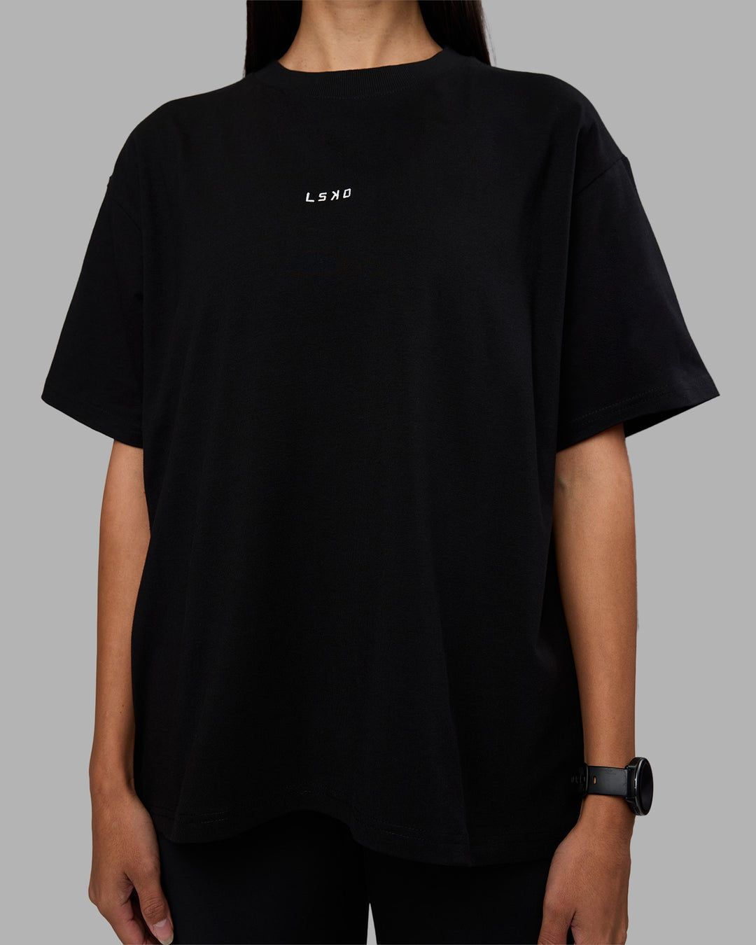 Woman wearing Go-To Heavyweight Oversized Tee - Black | Model:Rhiley | Size:S - view 4