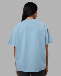 Woman wearing Go-To Heavyweight Oversized Tee - Glacier Lake | Model:Rhiley | Size:S | Thumbnail Index: 2