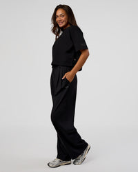 Woman wearing Go-To Heavyweight Reflective Skimmer Tee - Black-Reflective | Model:Kirstyn | Size:S | Thumbnail Index: 5