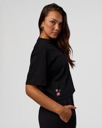 Woman wearing Go-To Heavyweight Reflective Skimmer Tee - Black-Reflective | Model:Kirstyn | Size:S | Thumbnail Index: 2