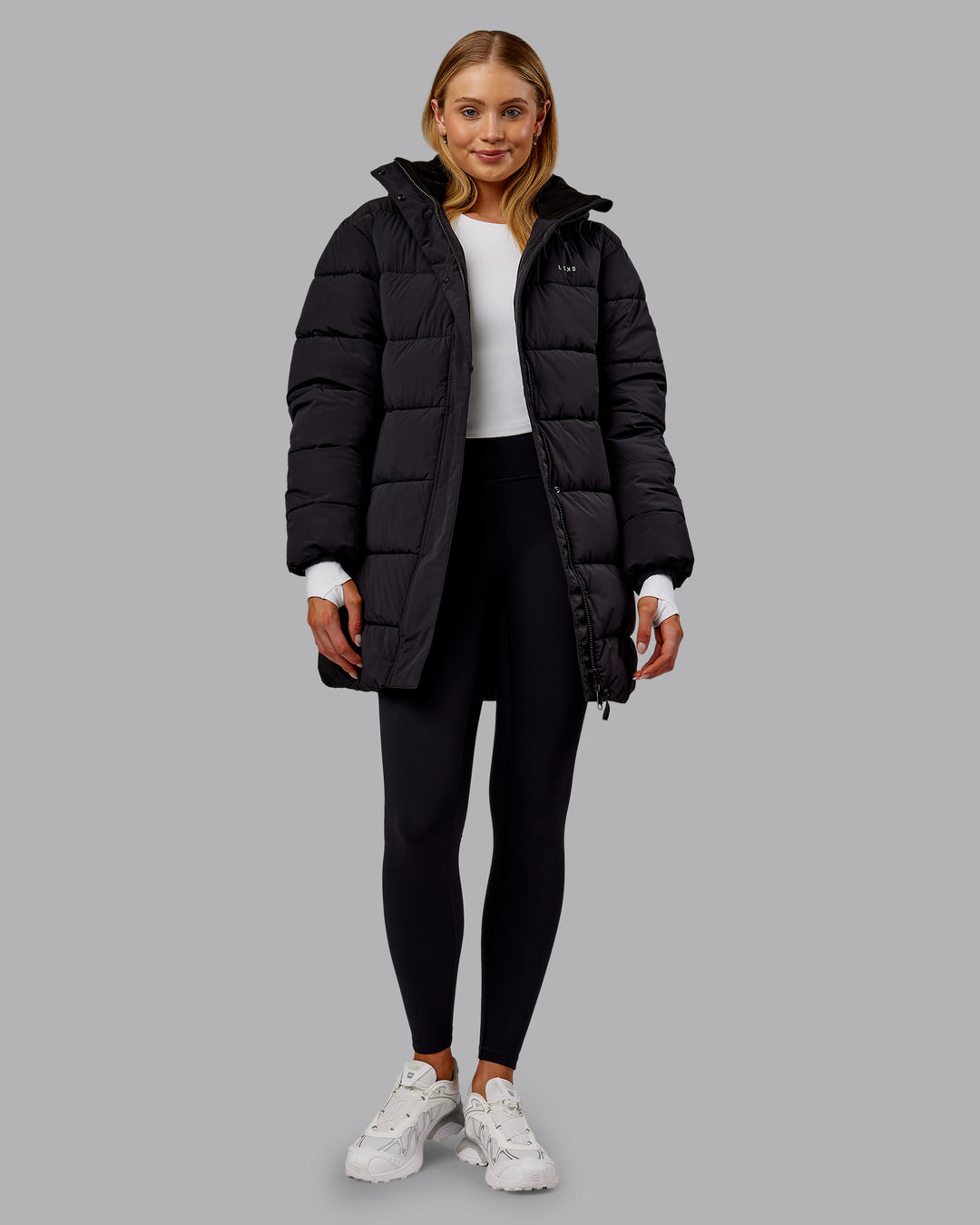 Woman wearing Go-To Puffer Long Jacket - Black | Model:Ella | Size:S - view 10