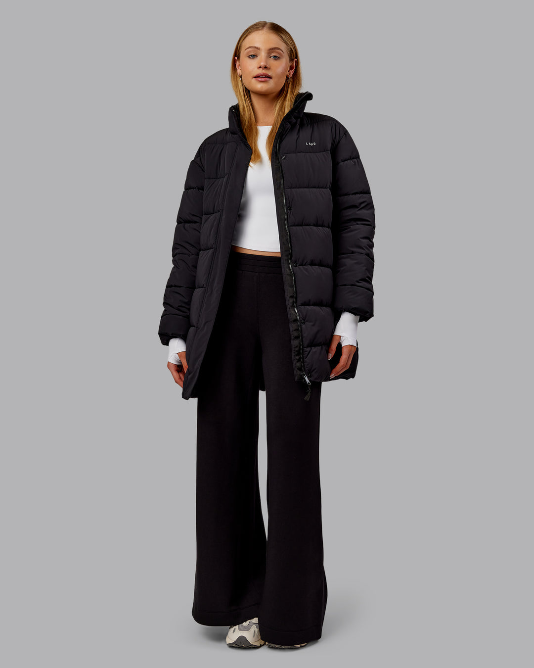 Woman wearing Go-To Puffer Long Jacket - Black | Model:Ella | Size:S - view 13