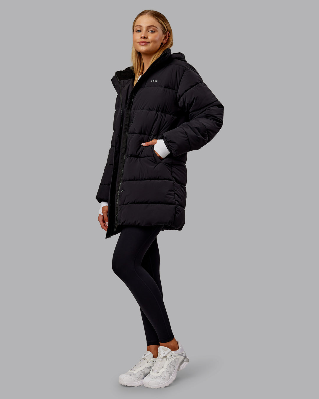 Woman wearing Go-To Puffer Long Jacket - Black | Model:Ella | Size:S - view 11