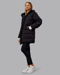 Woman wearing Go-To Puffer Long Jacket - Black | Model:Ella | Size:S | Thumbnail Index: 10