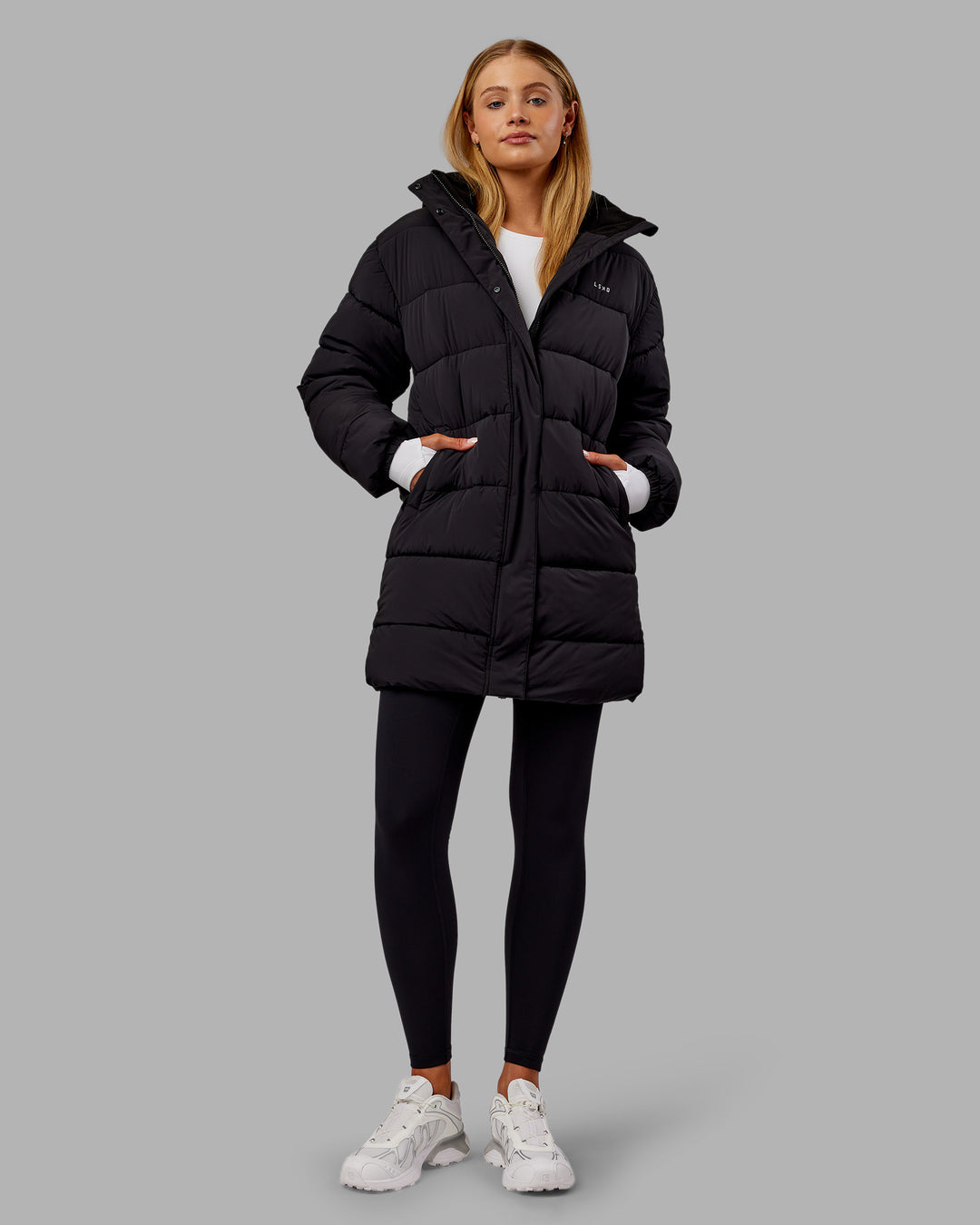 Woman wearing Go-To Puffer Long Jacket - Black | Model:Ella | Size:S - view 7