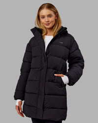 Woman wearing Go-To Puffer Long Jacket - Black | Model:Ella | Size:S | Thumbnail Index: 1