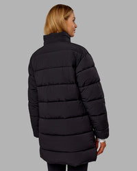 Woman wearing Go-To Puffer Long Jacket - Black | Model:Ella | Size:S | Thumbnail Index: 2