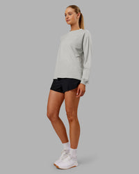 Woman wearing Go-To Long Sleeve FLXCotton Oversized Tee - Digital Mist-White | Model:Ella| Size:S | Thumbnail Index: 2