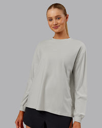 Woman wearing Go-To Long Sleeve FLXCotton Oversized Tee - Digital Mist-White | Model:Ella| Size:S | Thumbnail Index: 3