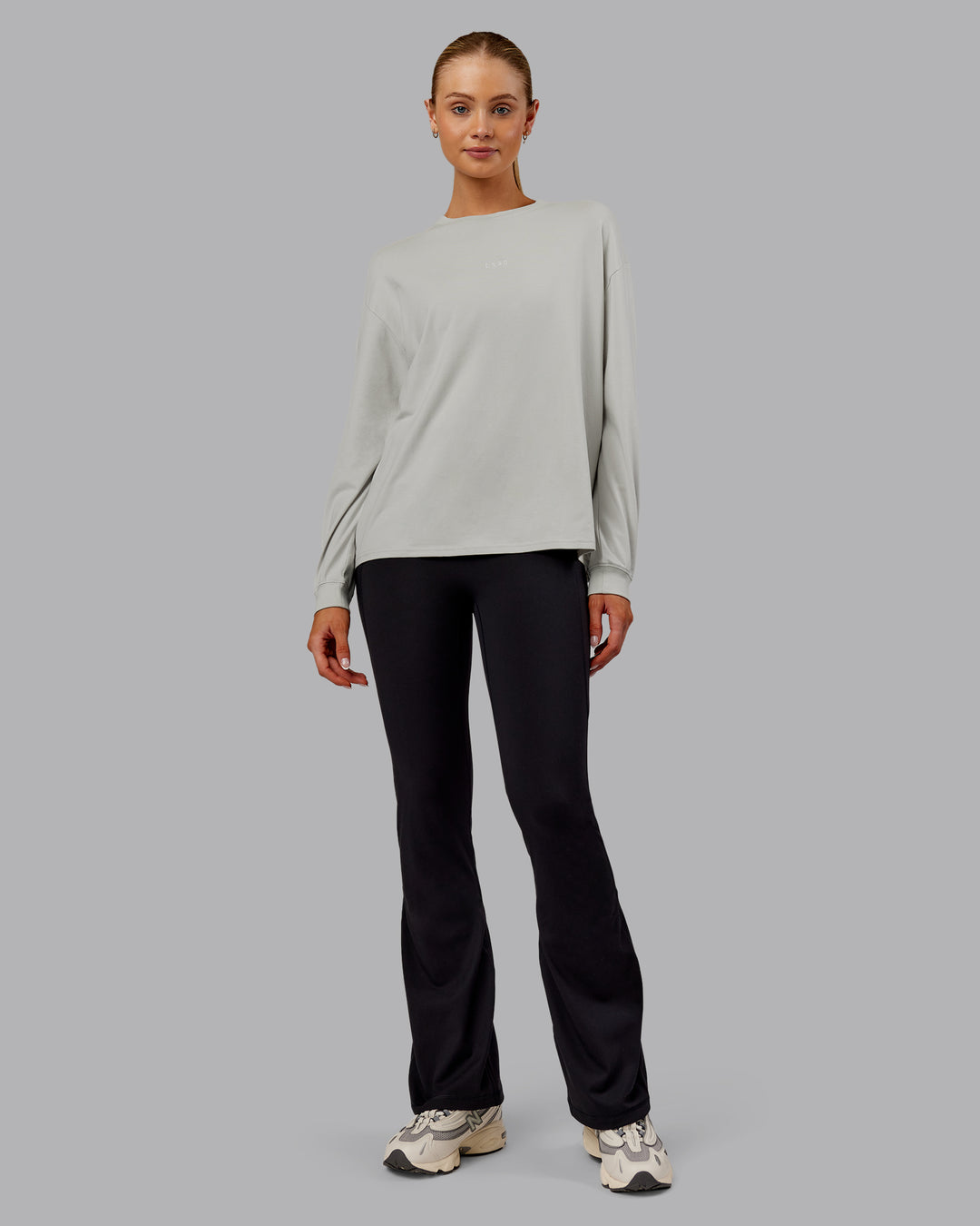 Woman wearing Go-To Long Sleeve FLXCotton Oversized Tee - Digital Mist-White | Model:Ella| Size:S - view 1