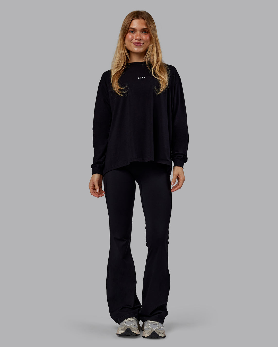 Woman wearing Go-To Long Sleeve FLXCotton Oversized Tee - Black-White | Model:Emilie | Size:S - view 2