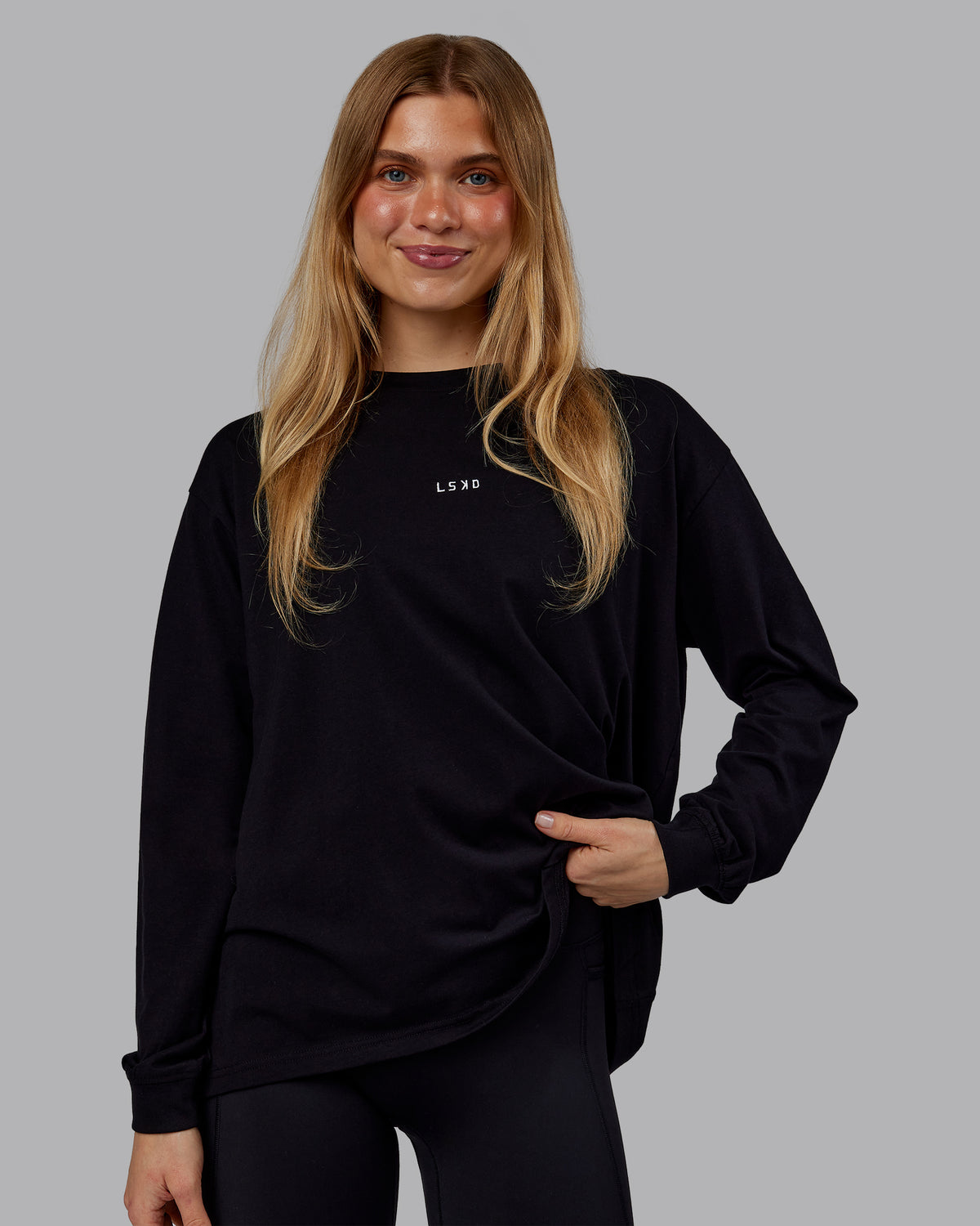 Woman wearing Go-To Long Sleeve FLXCotton Oversized Tee - Black-White | Model:Emilie | Size:S