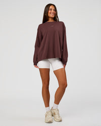 Woman wearing Go-To Long Sleeve FLXCotton Oversized Tee - Cocoa Powder-White | Model:Bianca | Size:S | Thumbnail Index: 6