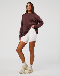 Woman wearing Go-To Long Sleeve FLXCotton Oversized Tee - Cocoa Powder-White | Model:Bianca | Size:S | Thumbnail Index: 4