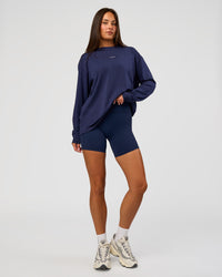 Woman wearing Go-To Long Sleeve FLXCotton Oversized Tee - Future Navy-White | Model:Bianca | Size:S | Thumbnail Index: 7